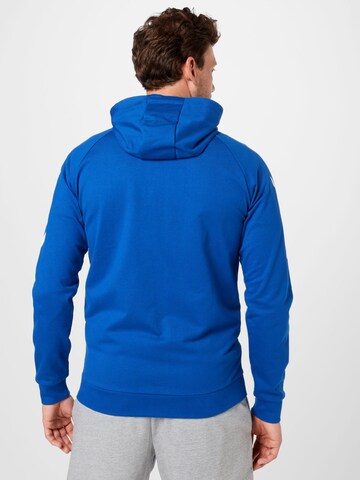 Bluză cu fermoar sport de la Hummel pe albastru