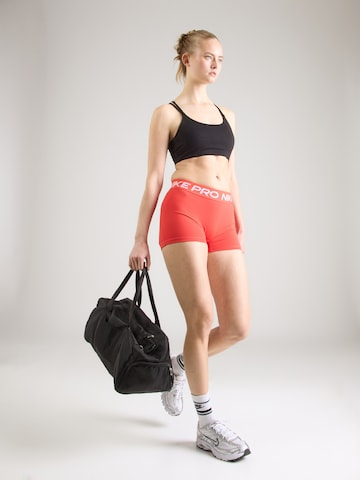 NIKE Skinny Workout Pants 'NP 365' in Orange