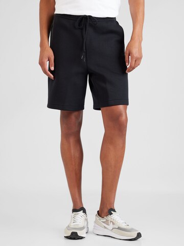 Nike Sportswear - Loosefit Pantalón en negro: frente