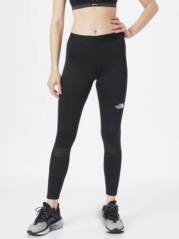 THE NORTH FACE Skinny Workout Pants in Black: front