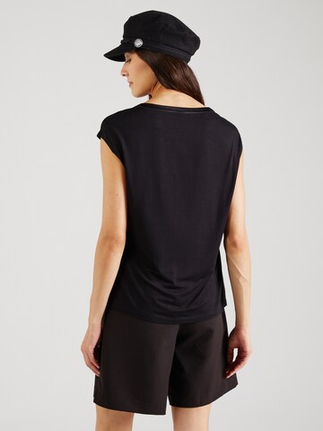 COMMA - Blusa en negro