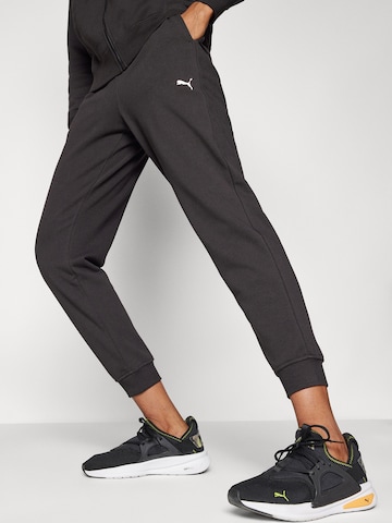 PUMA Tapered Sportbroek 'TAD Essential' in Zwart