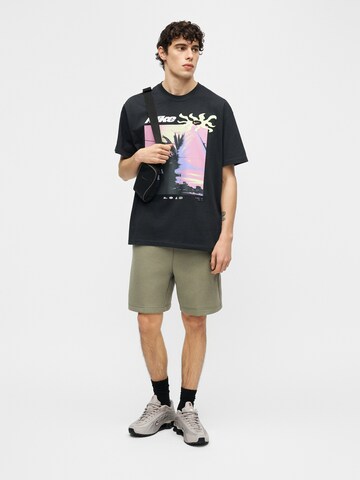 Nike Sportswear Loosefit Shorts 'TECH FLC' in Grün