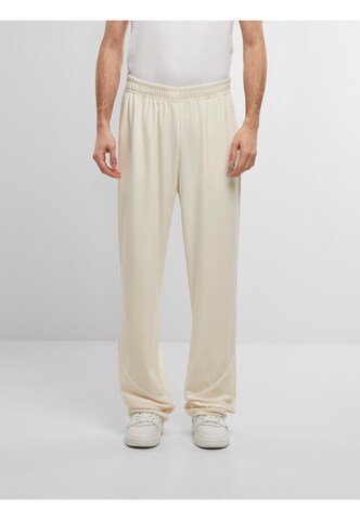 Loosefit Pantalon de sport ' ' Karl Kani en beige