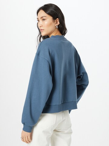 Sweat-shirt 'Amaze' WEEKDAY en bleu