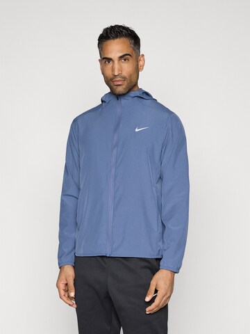 NIKE Trainingsjack 'Form' in Blauw: voorkant