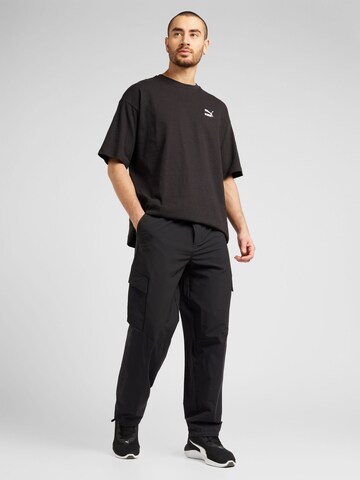 Regular Pantalon de sport 'SEASONS' PUMA en noir