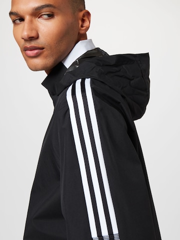 ADIDAS SPORTSWEAR Trainingsjack 'Tiro 21 All-Weather' in Zwart