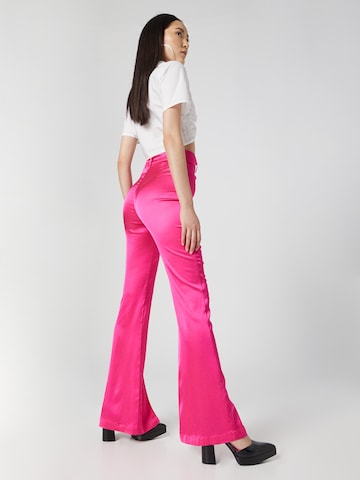 Katy Perry exclusive for ABOUT YOU Flared Pants 'Nancy' in Pink