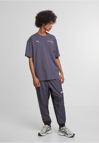 Tapered Pantaloni di PUMA in grigio