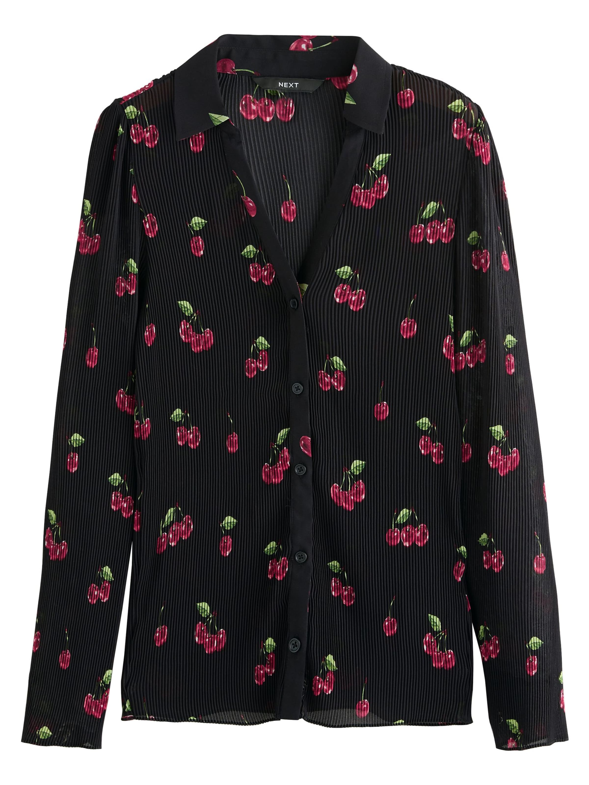 Next Blus i svart: framsida