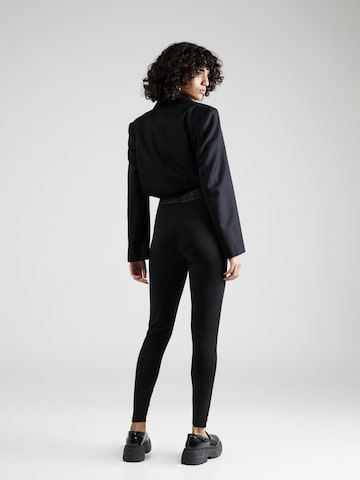 ABOUT YOU Normalny krój Spodnie 'Tasha' w kolorze czarny