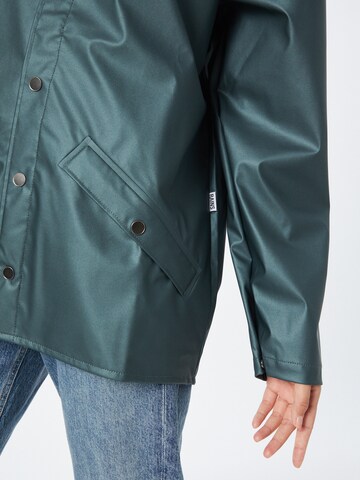 RAINS Toiminnallinen takki värissä vihreä