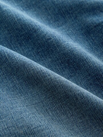 Coupe slim Jean 'Motion Flex' Next en bleu