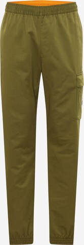 Nike Sportswear Trousers in Green: front