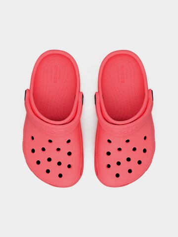 Crocs - Zapatos abiertos 'Classic' en naranja
