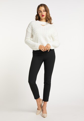 Pullover di faina in bianco