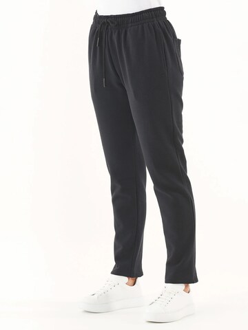 Organication Regular Pants in Black: front