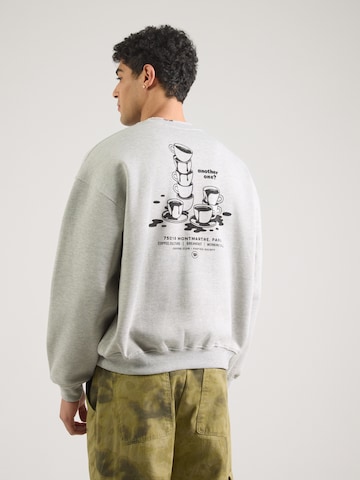 Kaotiko Bluzka sportowa 'ANOTHER ONE' w kolorze szary: przód