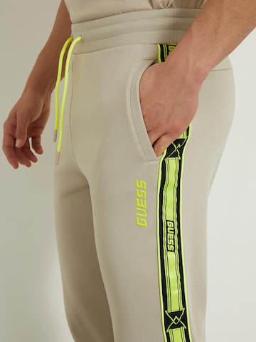 GUESS Regular Workout Pants in Beige
