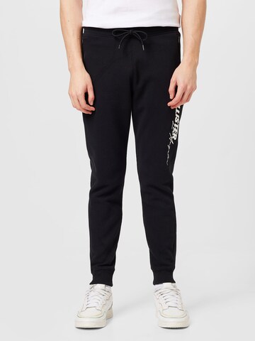 HOLLISTER Tapered Trousers in Black: front