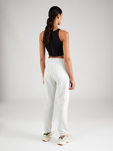 Effilé Pantalon de sport Athlecia en blanc