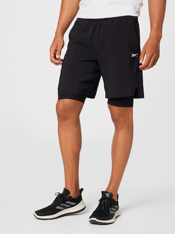 Reebok Regular Workout Pants in Black: front