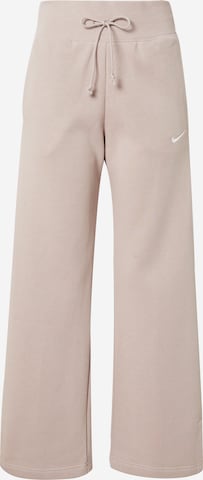 NIKE - Perna larga Calças de desporto em cinzento: frente