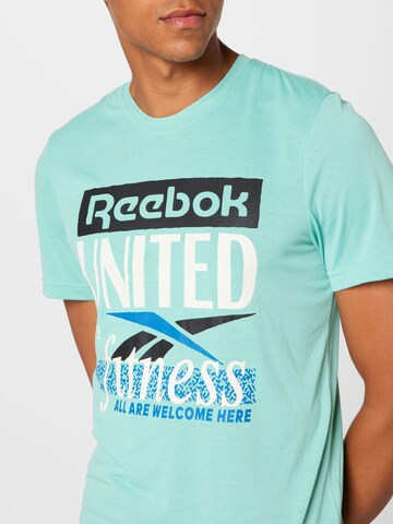 T-Shirt fonctionnel 'United by Fitness' Reebok en bleu
