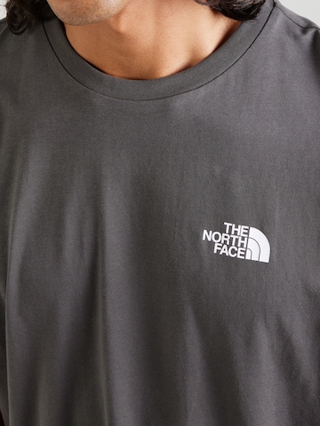Tricou 'EXPLORE GEAR' de la THE NORTH FACE pe gri