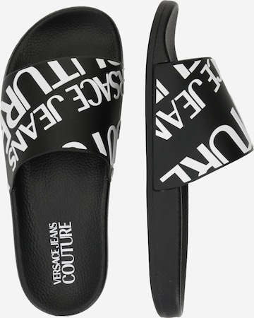 Saboți 'SHELLY' de la Versace Jeans Couture pe negru
