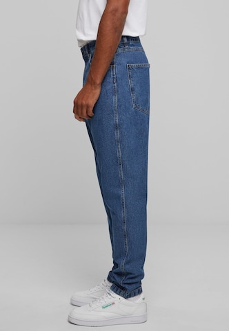 Karl Kani Zwężany krój Jeansy w kolorze niebieski