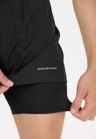 ENDURANCE Regular Sports trousers 'Less' in Black