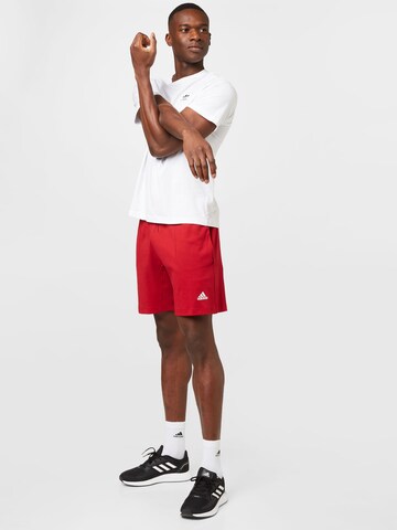 ADIDAS SPORTSWEAR Normalny krój Spodnie sportowe 'Donovan Mitchell' w kolorze czerwony