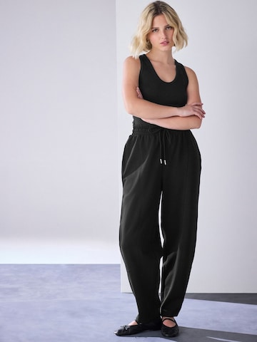 Next - Top en negro