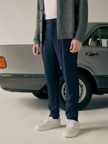 ABOUT YOU x Alvaro Soler Regular Trousers with creases 'Emir' in Blue: front