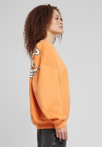 Sweat-shirt Karl Kani en orange