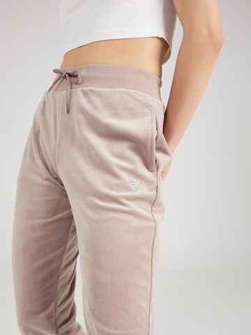 GUESS Tapered Sporthose in Beige
