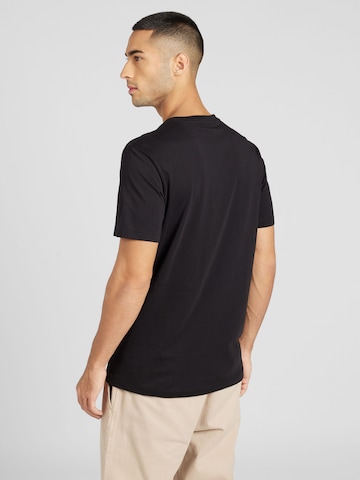 Calvin Klein Jeans Normalny krój Koszulka w kolorze czarny