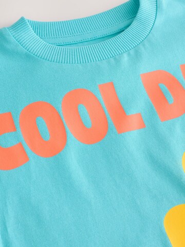 Next - Camiseta en azul