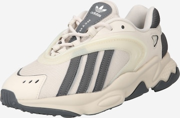 Baskets basses 'Oztral' ADIDAS ORIGINALS en beige : devant