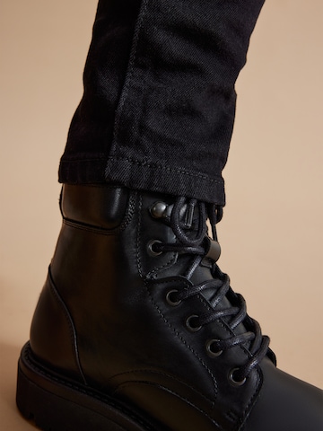 DAN FOX APPAREL Schnürboots 'Timur' in Schwarz