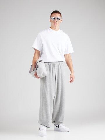 Nike Sportswear Tapered Broek 'CLUB' in Grijs