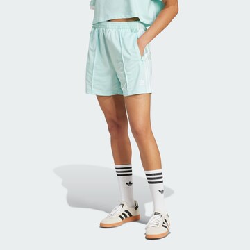 ADIDAS ORIGINALS Свободный крой Штаны 'Firebird' в Синий: спереди