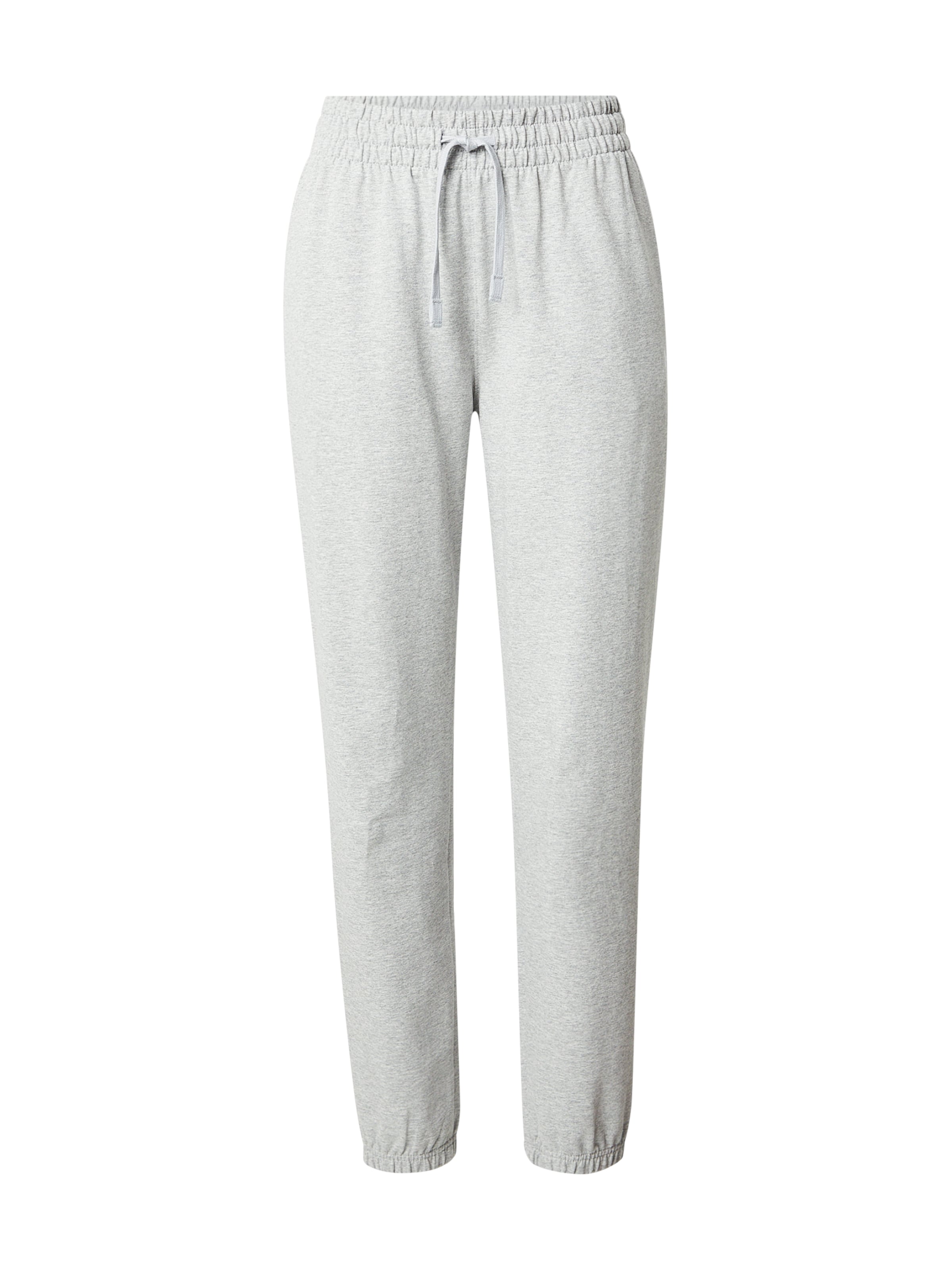 UNDER ARMOUR Tapered Sports trousers in Grey: front