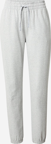 UNDER ARMOUR Tapered Sports trousers in Grey: front