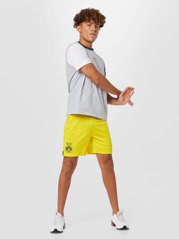 Regular Pantaloni sport de la PUMA pe galben