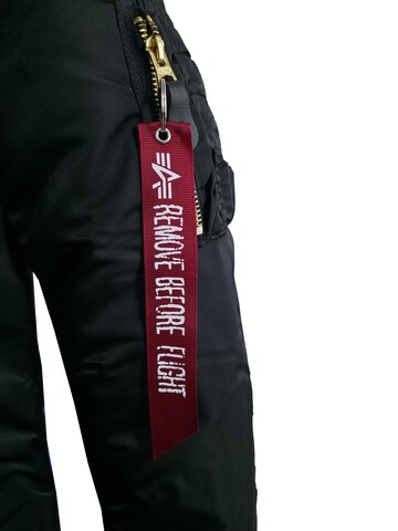 ALPHA INDUSTRIES Winter Jacket 'Long Fishtail' in Black