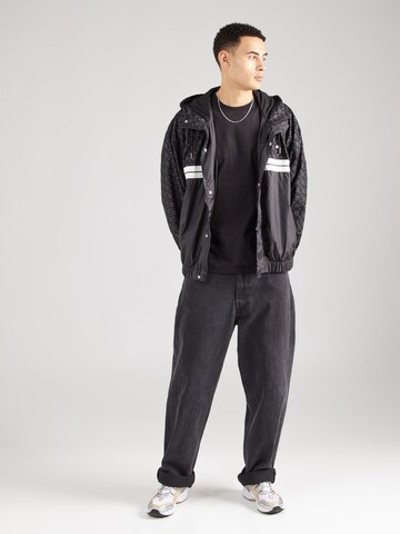 ELLESSE Between-season jacket 'Trezi' in Black