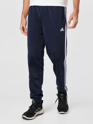mėlyna ADIDAS SPORTSWEAR Siaurėjantis Sportinės kelnės 'Essentials Warm-Up Tapered 3-Stripes': priekis